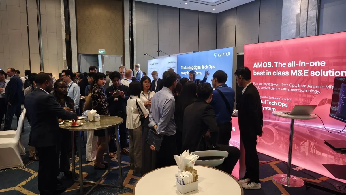 Networking beside an LED backdrop wall